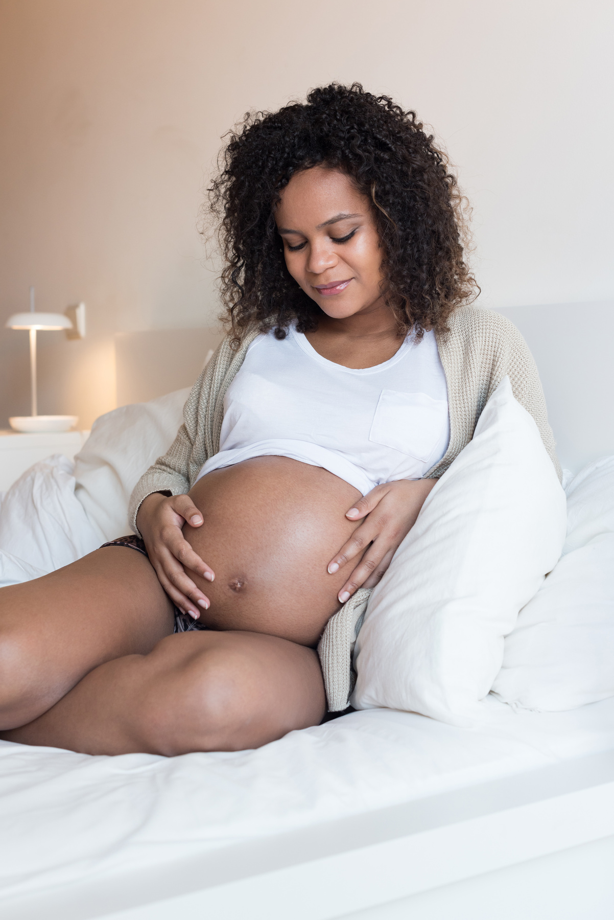 Pregnant Woman Touching Her Belly